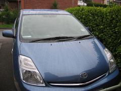 Blue Prius (rain)